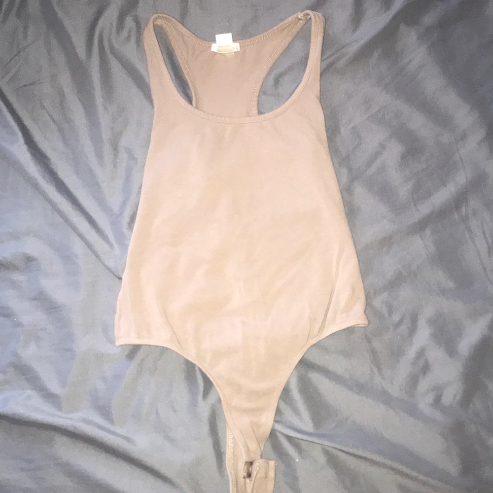 Taupe colored body suit
